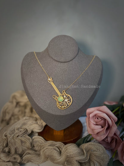 The Golden Guitar Necklace - Handmade Wire Wrapped Jewelry